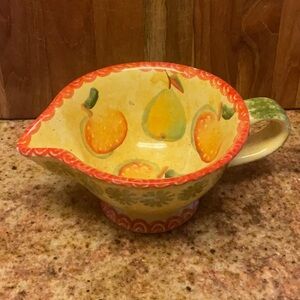 WCL pottery vintage gravy/sauce pitcher featuring a design of apples/pears